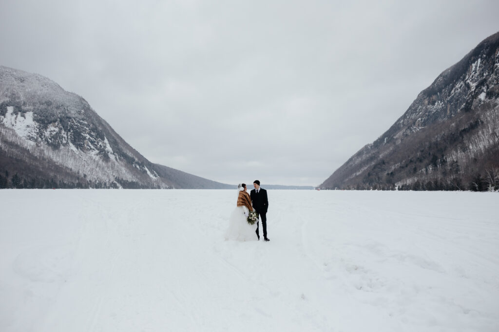 Vermont Winter Elopement Bride and Groom on Frozen Lake